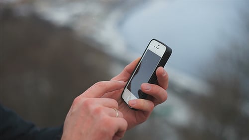 Man Typing on Your Phone