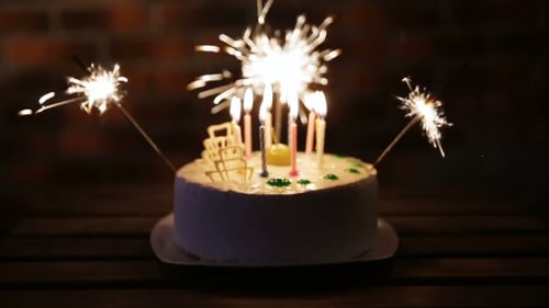 Birthday Cake with Sparklers and Candles