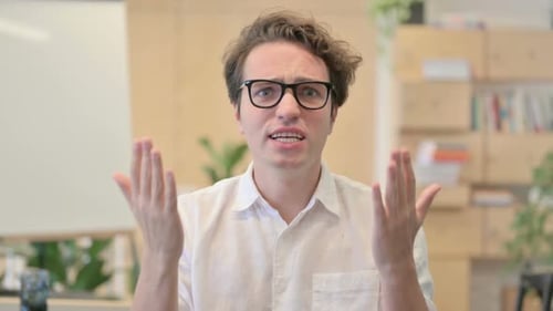 Distressed Man Reacting with Frustration