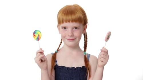 Girl Chooses Between Two Lollipops