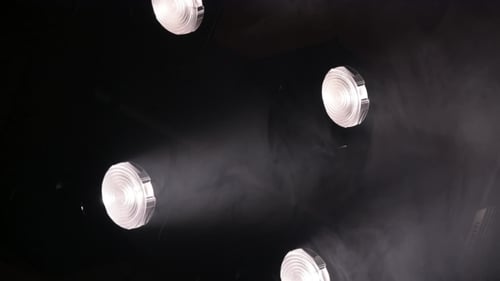 Abstract Stage Lighting with White Smoke on Black