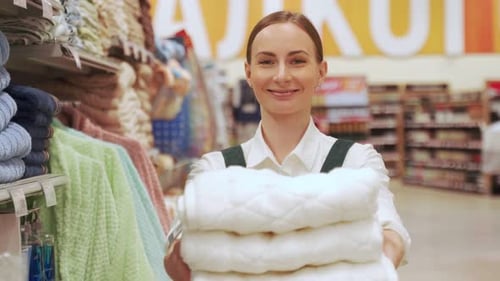 Store Manager Advertises Buying Products in Mall Closeup