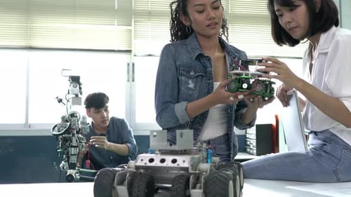 Group young working with microchip electronic