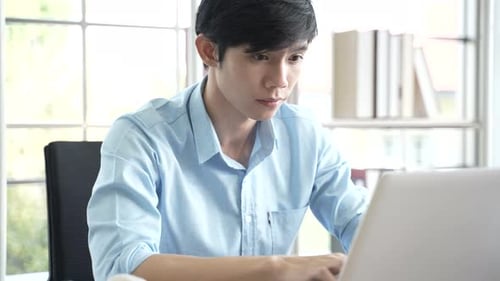 businessman typing a computer keyboard, working at the office or work from home, online work