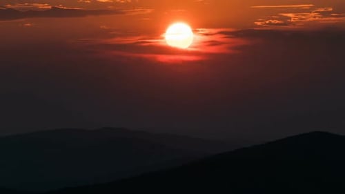 Gorgeous Sunrise Behind Layers of Mountains