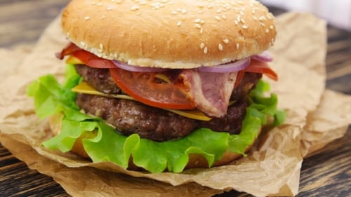 Delicious Double Cheeseburger on Rustic Brown Paper