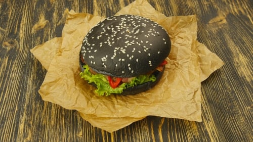 Gourmet Black Burger on Parchment Paper