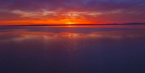 Scenic Sunset Over Calm Ocean at Twilight