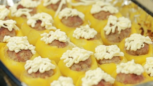 Stuffed Yellow Bell Peppers with Meatballs and Cheese