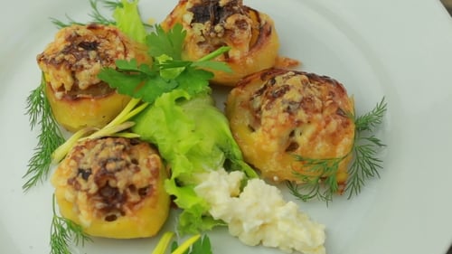 Delicious Potato Dish Served with Green Garnish