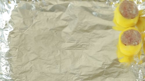 Meatballs in Potato Cups on Foil-Lined Tray