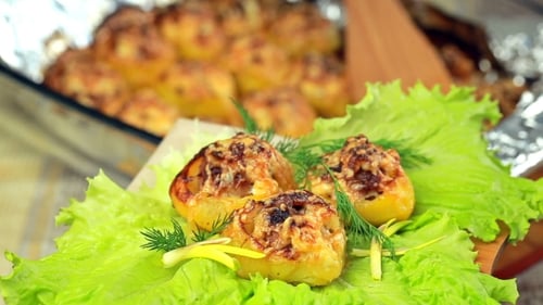 Close-up of Delicious Cooked Potatoes on Green Lettuce