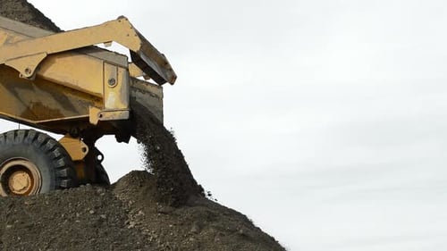 Truck Unloading Sand