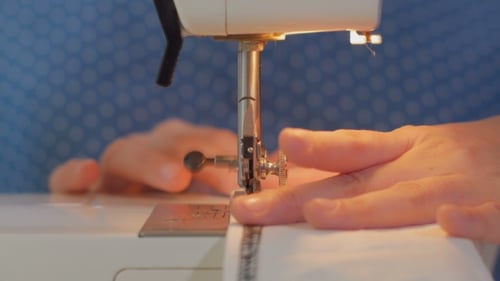 Sewing Machine Stitching White Fabric Close Up