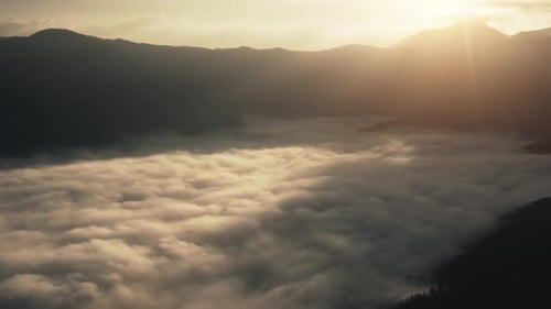 Mountain Valley Under Haze Morning Fog