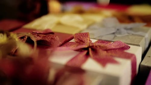 Wrapped Gift Boxes with Ribbons and Bows