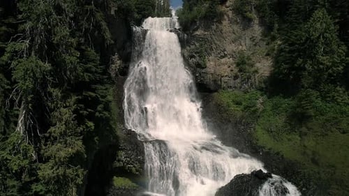 Scenic Aerial of Multi-tiered Waterfall in Wilderness