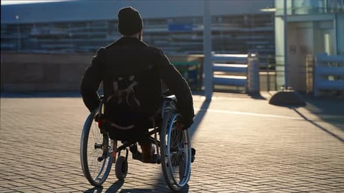 Disabled Man Outdoor in Sunny Morning