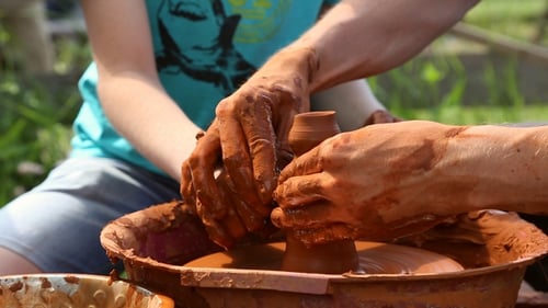 Craftsman Forming Clay on Potter's Wheel, Close Up