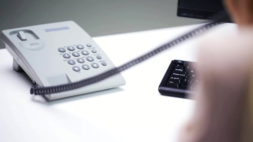 Woman Hand Dialing Number On Telephone At Office 66