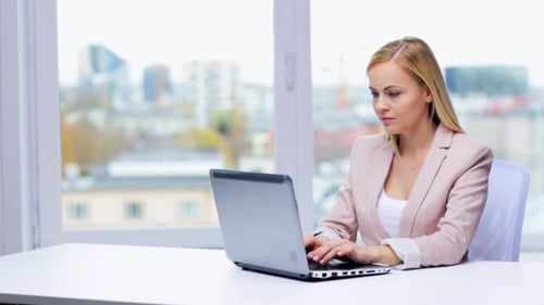 Young Businesswoman With Laptop Typing At Office 29