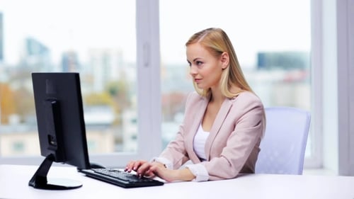 Young Businesswoman With Computer Typing At Office 4