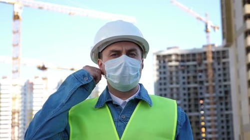 Worker Staff in White Helmet Put on and Put Off Medical Mask at Construction Site