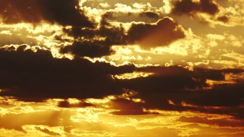 Brilliant Golden Sunset with Clouds and Sun Rays