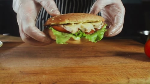 Close Up of a Sandwich Being Assembled