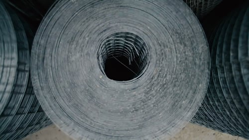 Rolls of Abstract Circular Metal Wire Mesh