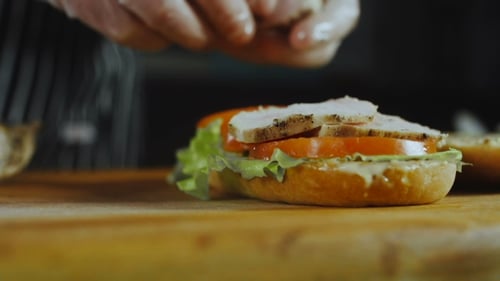 Chef Assembling Sandwich in Restaurant Kitchen