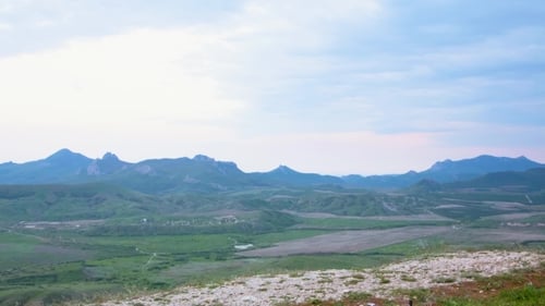 Mountain Biker Exploring Hilly Terrain