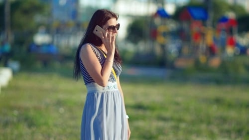 Young Beautiful Smiling Woman Talking On Cell Phone