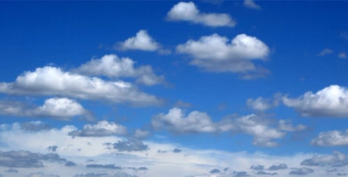 Clouds Moving in Blue Sky on a Summer Day
