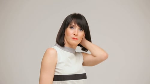 Elegant Woman Posing in Studio