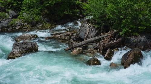 The Mountain River With Blue Water
