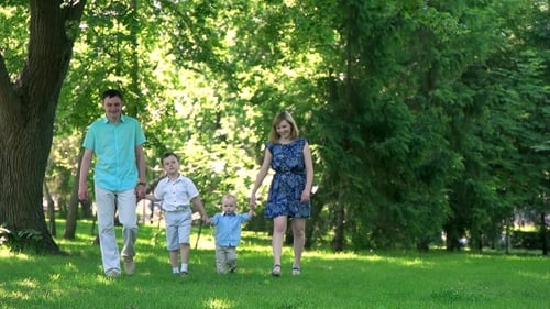 Happy Family Going On a Walk