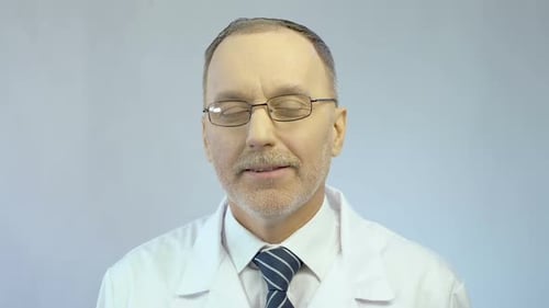 Adult Man with a Mustache in a White Coat