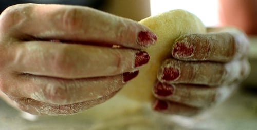 Woman Prepares Dough with Cherries at Home