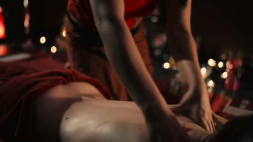 Relaxing Massage Session in Soft Lighting