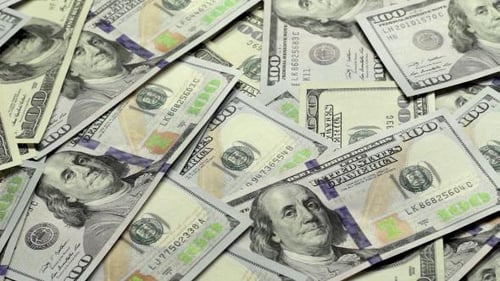 Pile of US Hundred Dollar Bills Close Up