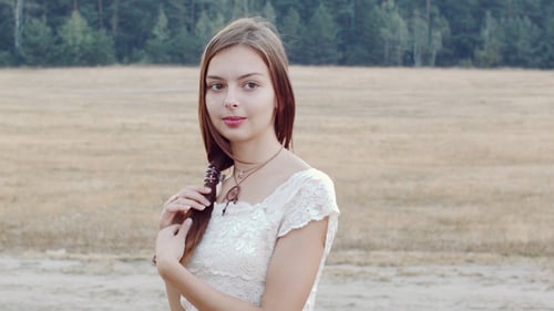 Woman Posing in a Rural Field