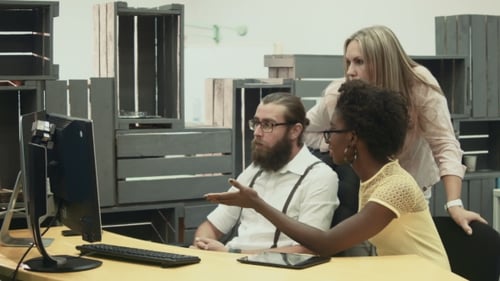 Team Collaboration at Computer in Modern Office