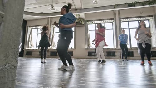 Dance Class Practicing Choreography in a Bright Studio