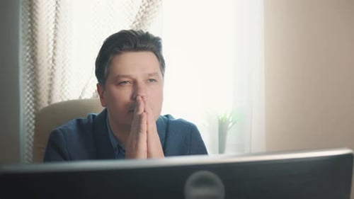 Man Reads a Prayer Folded His Hands