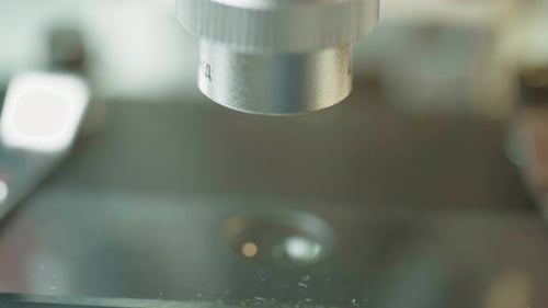 Close Shot Microscope Lenses Conducting Research In Medical Laboratory