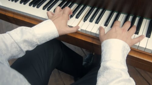 Hands Playing Beautiful Piano Music