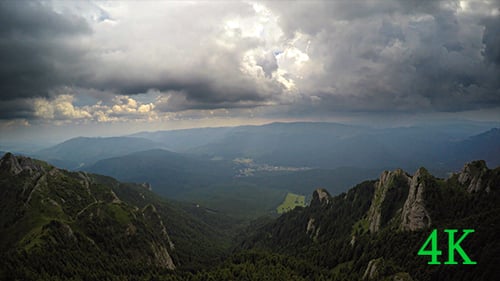 Aerial View of Mountains and Dramatic Clouds