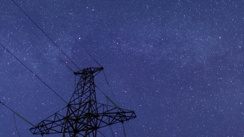 Power Transmission Line Tower On a Starry Sky.