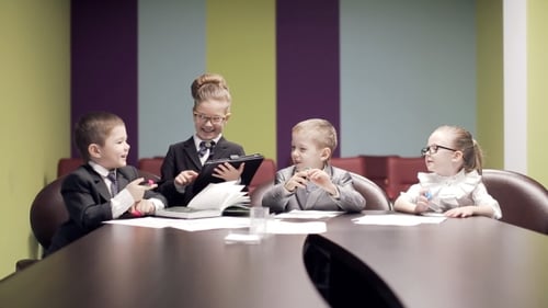 Small Children At Meeting In Office.static Shot